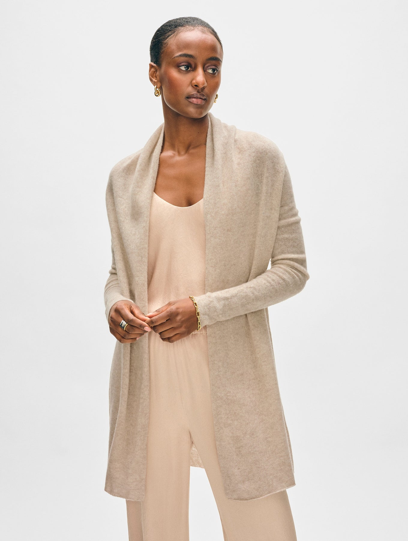 Model wearing sandwisp cashmere long cardigan.