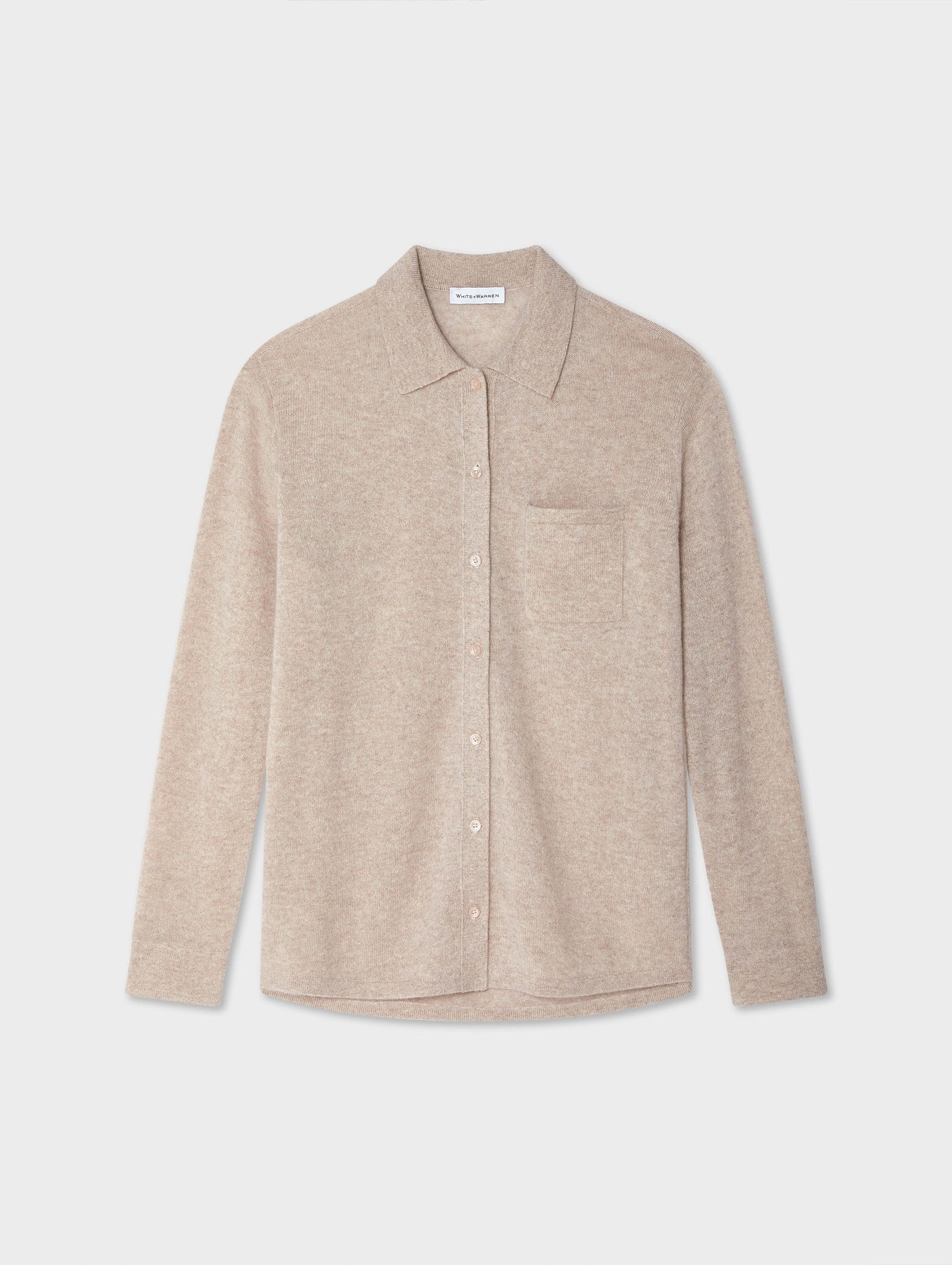 beige button down collared shirt