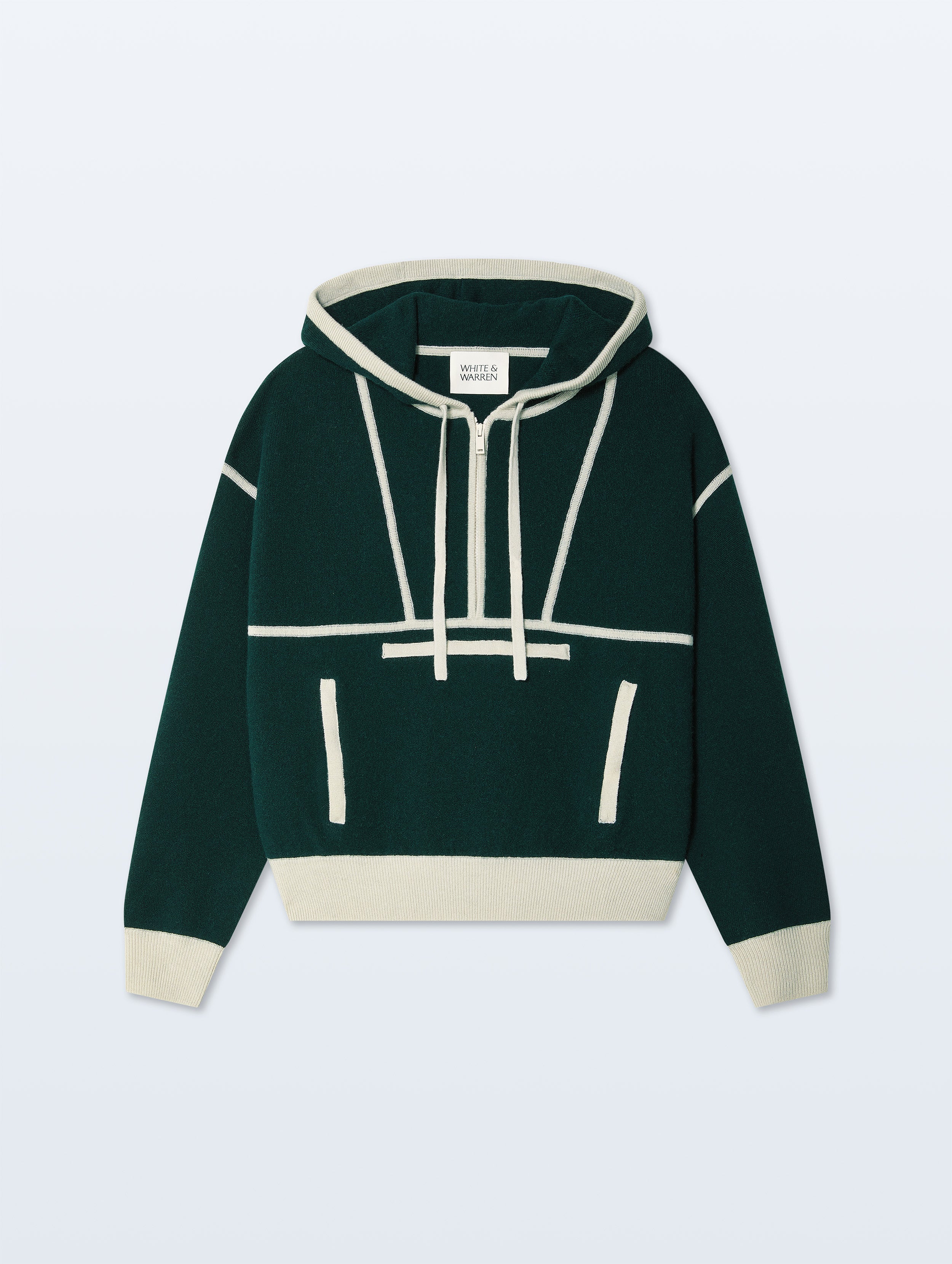 A dark green cropped knit hoodie with cream-colored contrast details, including the hood, cuffs, hem, and graphic line patterns on the front, displayed against a light gray background.