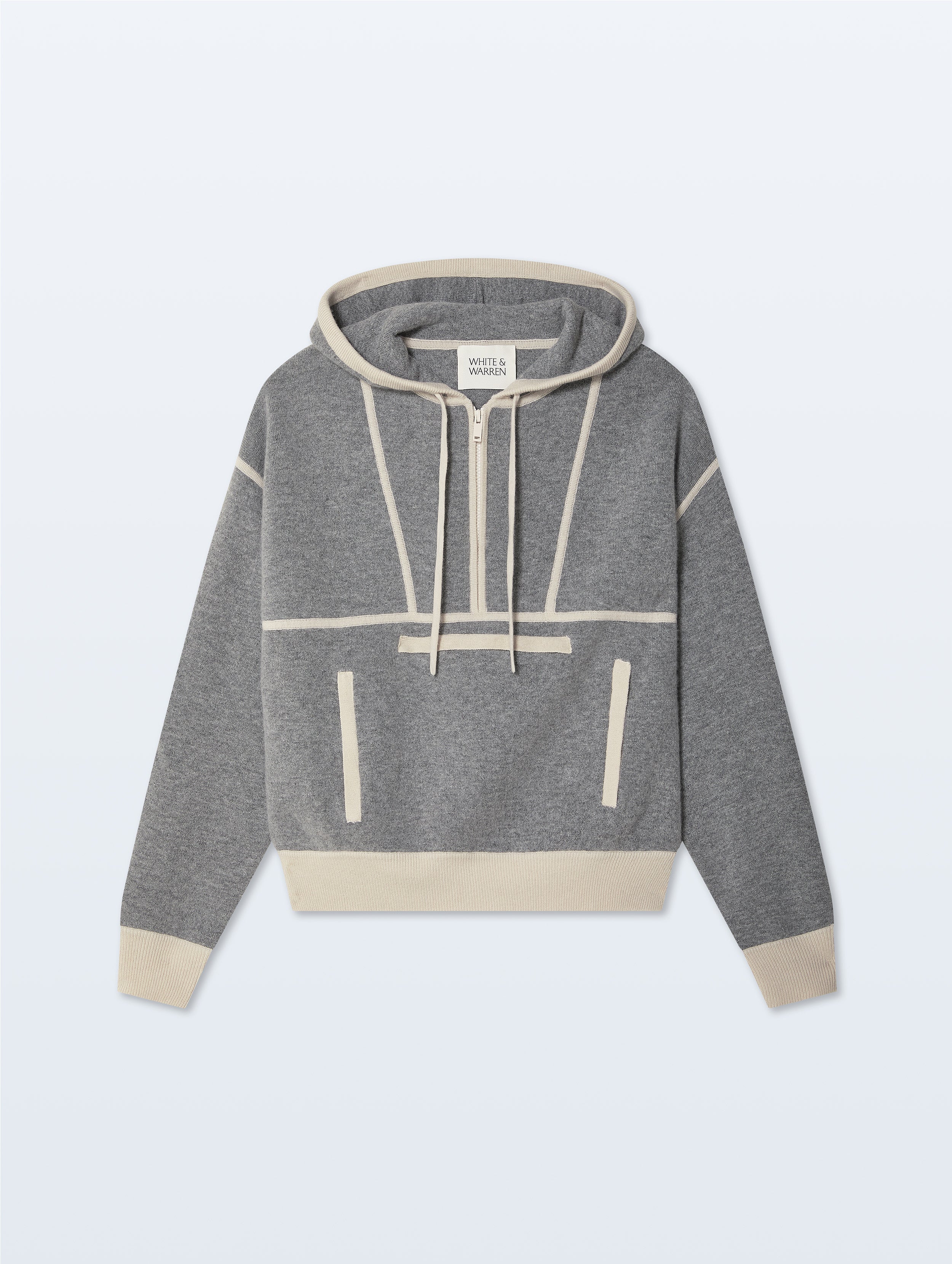 A gray heathered knit hoodie with cream-colored contrast stitching, drawstrings, and ribbed cuffs and hem, displayed flat against a light gray background.