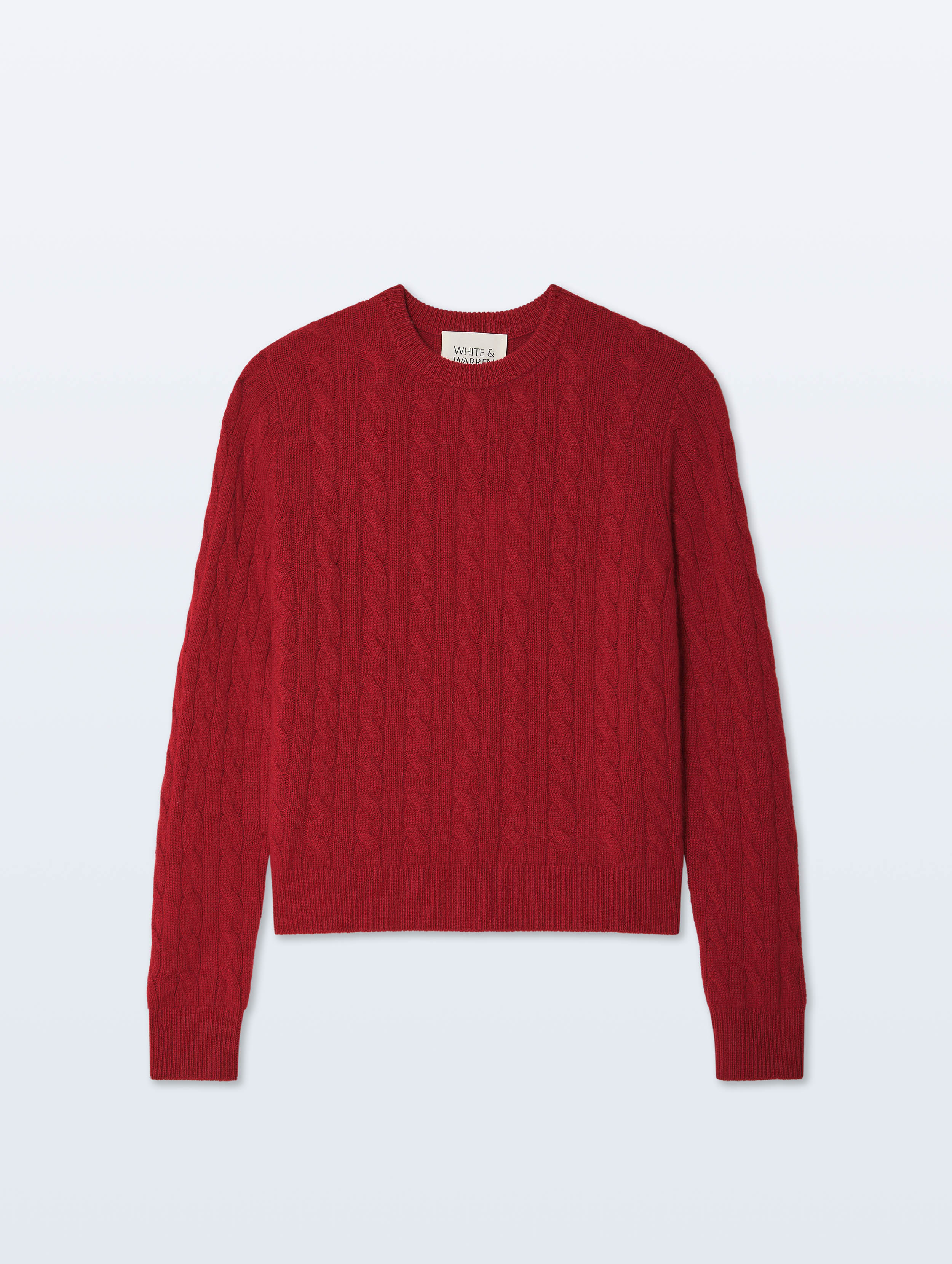 A red cable-knit crewneck sweater displayed flat against a light gray background.