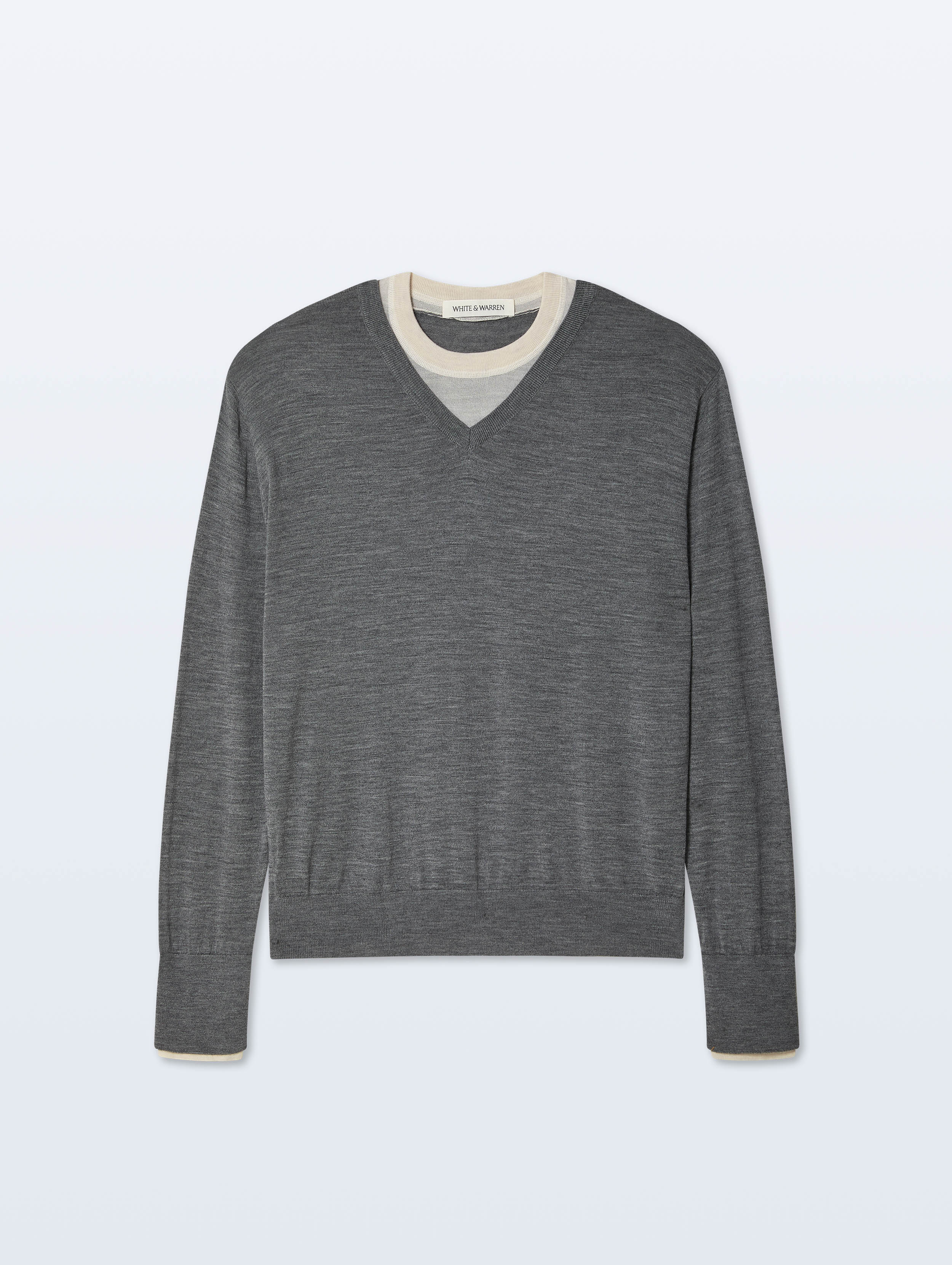 A dark gray v-neck knit sweater with contrasting cream ribbed trim at the collar and cuffs, displayed flat against a light gray background.