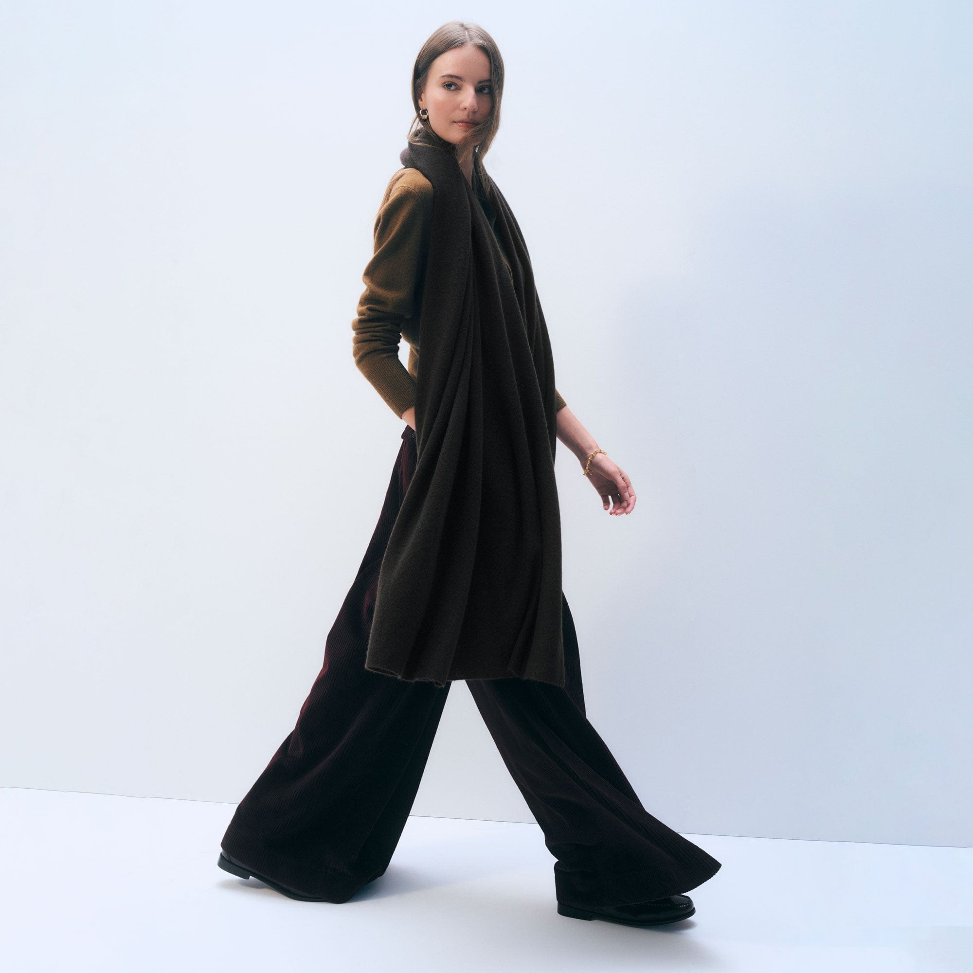 I love the color, weight, and softness. Must have wardrobe accessory.